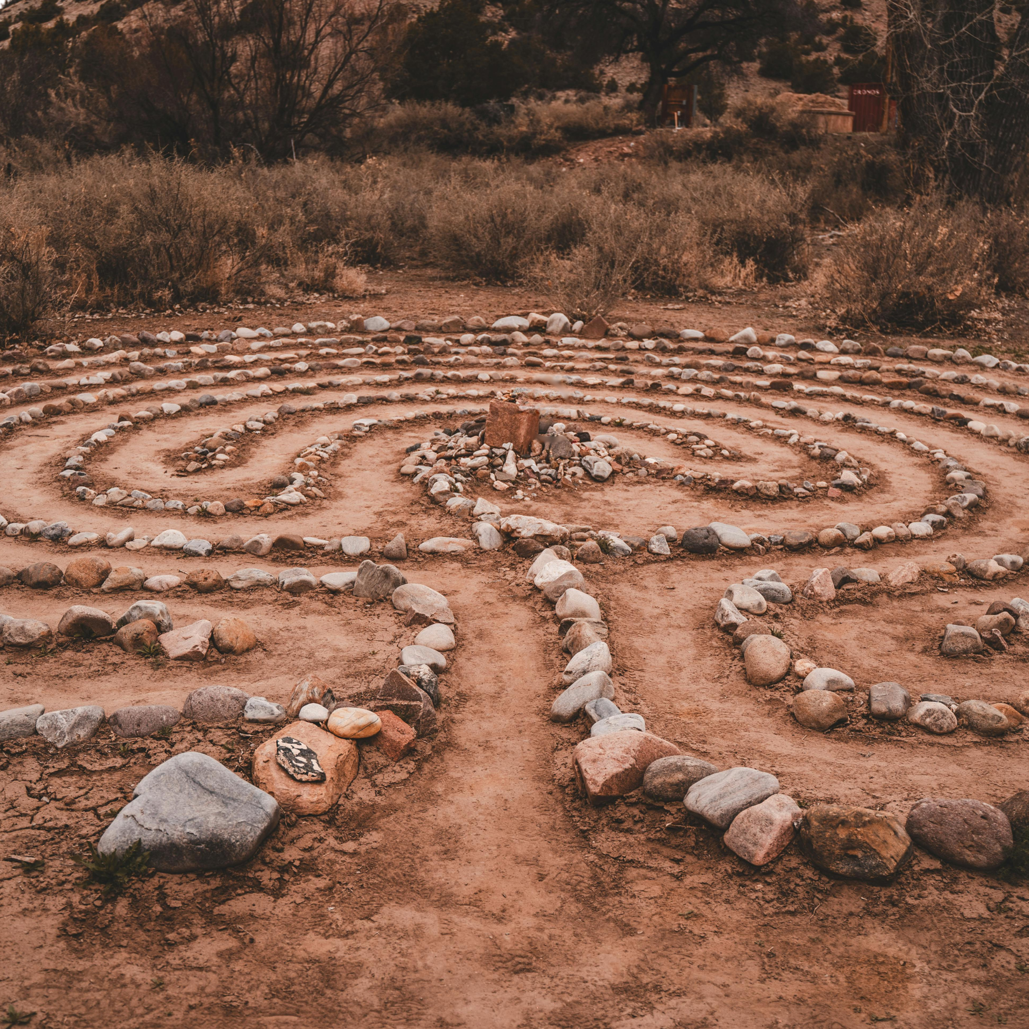 photo of a desert labyrinth made of rocks